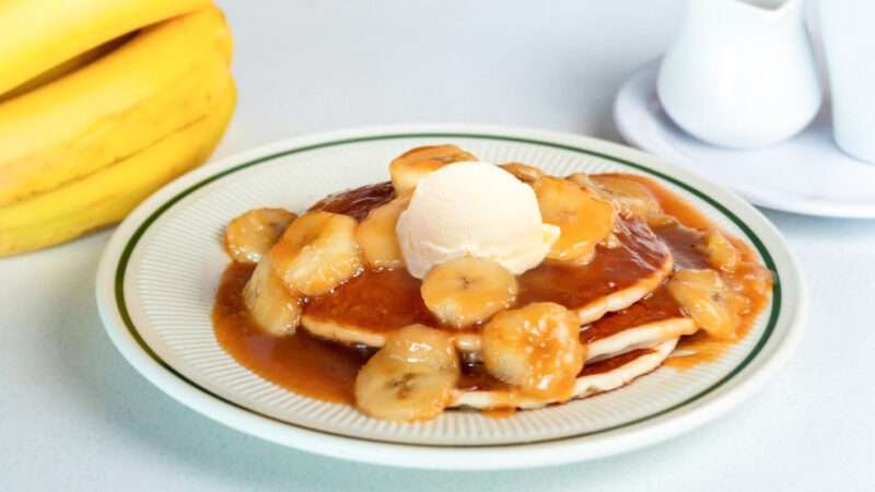 Delicious Banana Foster dessert with caramelized bananas and rich sauce at Tasty Munch.