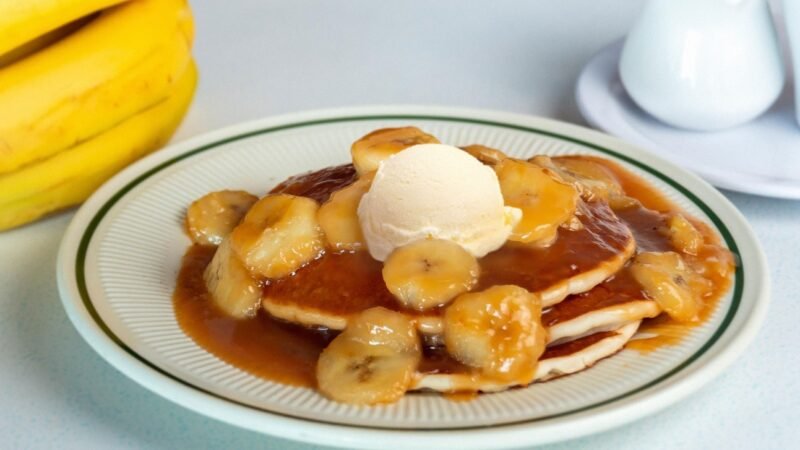 Delicious Banana Foster dessert with caramelized bananas and rich sauce at Tasty Munch.