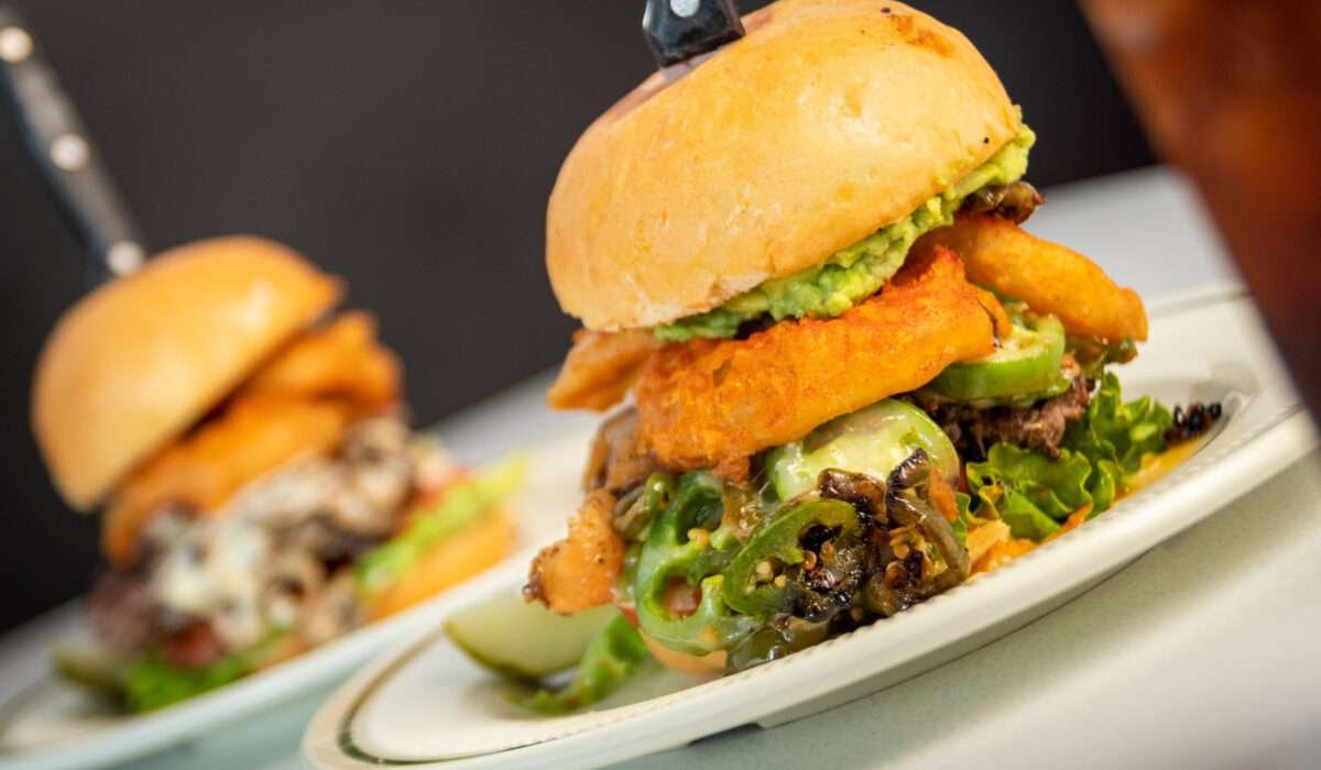 Fuego Burger with jalapeños, melted pepper jack cheese, and spicy sauce at Tasty Munch.