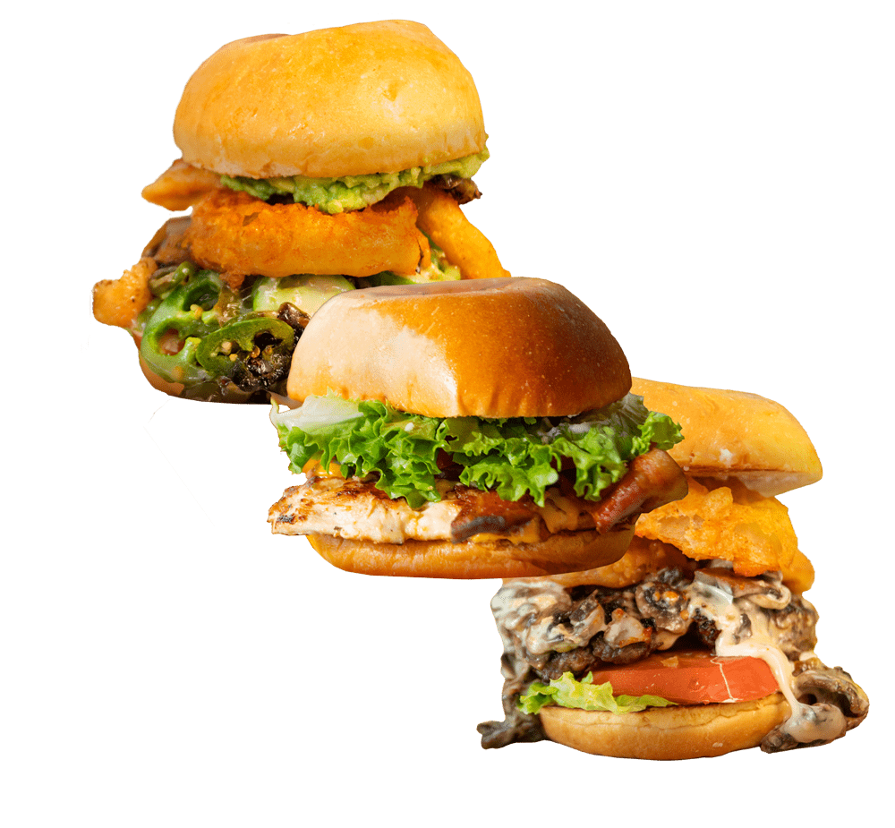 Three burgers with melted cheese, lettuce, and tomatoes at Tasty Munch Houston.
